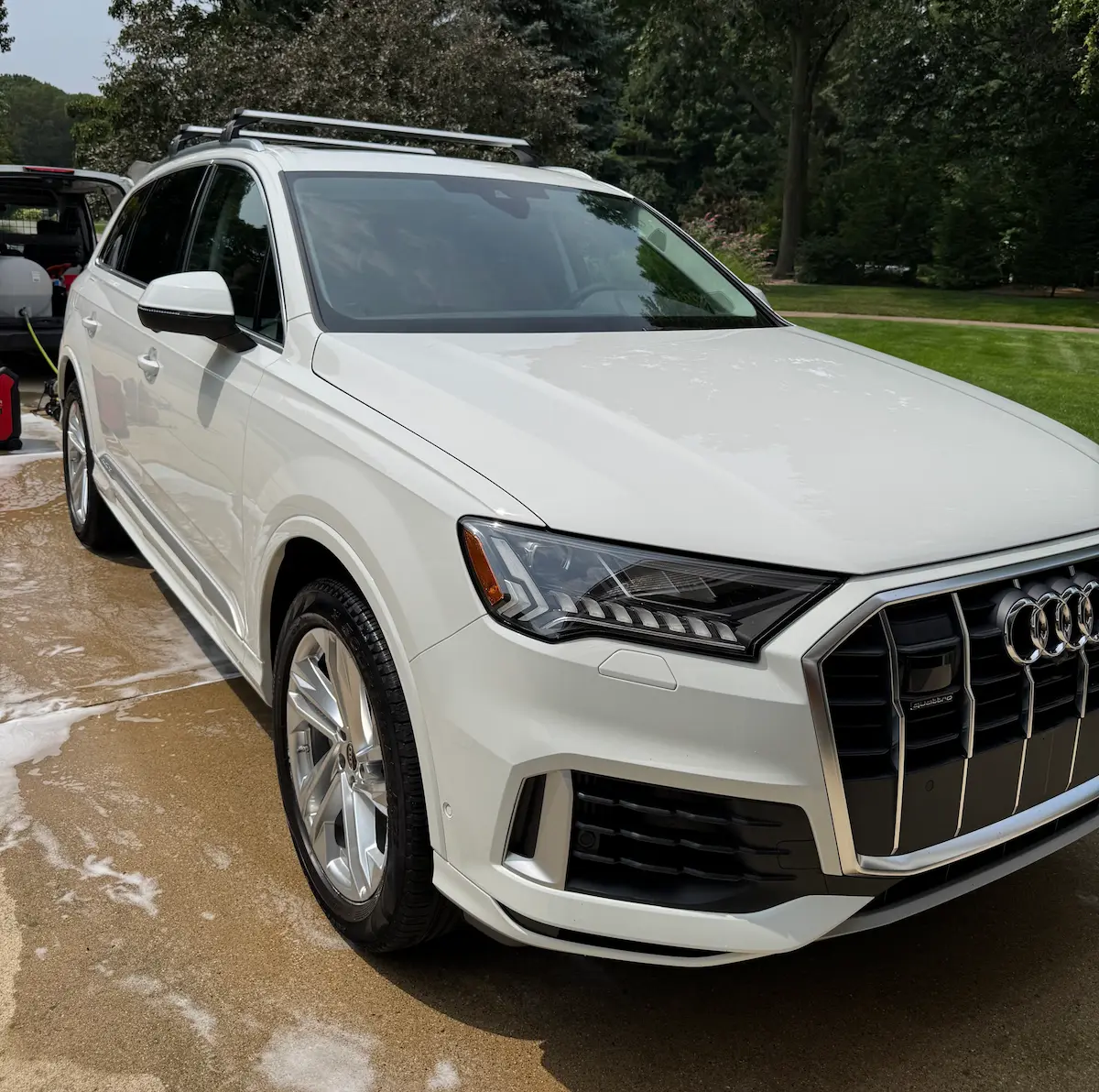 Restored vehicle finish after paint correction and ceramic sealant application by Elysian Auto Detailing in Grand Rapids, showing reduced scratches and enhanced gloss